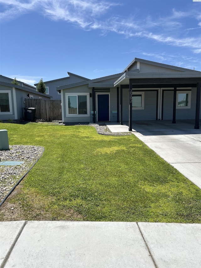 2502 Blaine St, Pasco, WA 99301 - single story home featuring concrete driveway and an attached carport