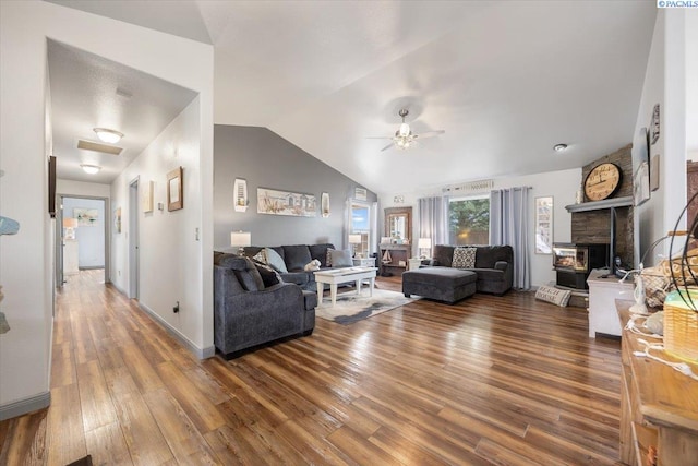 4210 Desert Plateau, Pasco, WA 99301 - living area with lofted ceiling, wood finished floors, ceiling fan, and a fireplace