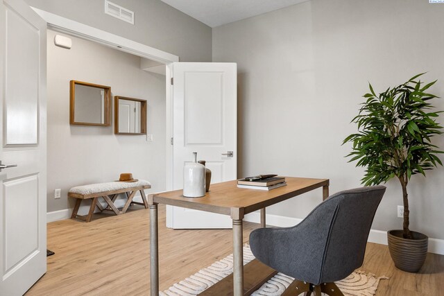 office space featuring light wood-type flooring