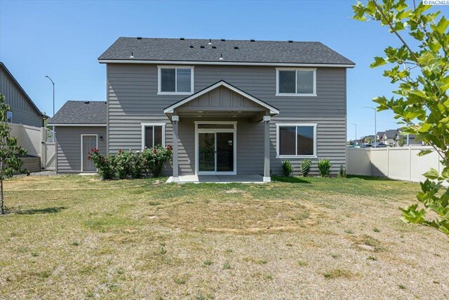 200 Ladera St, Prosser, WA 99350 - rear view of house featuring roof with shingles