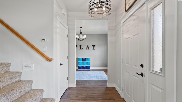 607 N Quebec St, Kennewick, WA 99336 - entrance foyer featuring a chandelier, stairway, and dark wood-type flooring