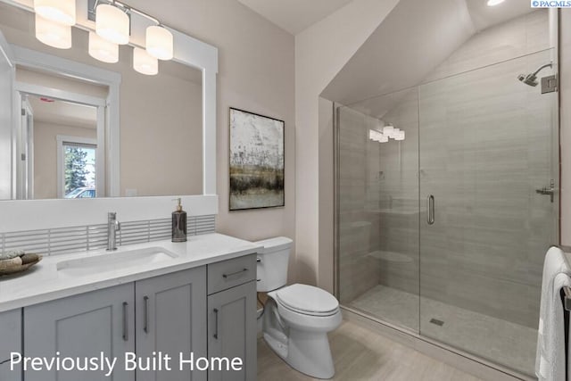 6008 Rd 122, Pasco, WA 99301 - full bath featuring vanity, toilet, and a stall shower