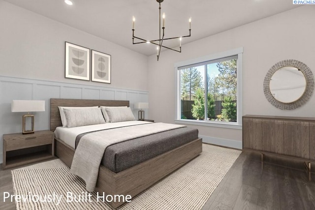 6008 Rd 122, Pasco, WA 99301 - bedroom with recessed lighting, a notable chandelier, a wainscoted wall, and wood finished floors