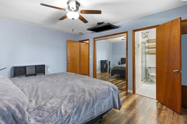 405 W 7th Ave, Ritzville, WA 99169 - bedroom featuring hardwood / wood-style flooring, ensuite bathroom, ceiling fan, and a closet