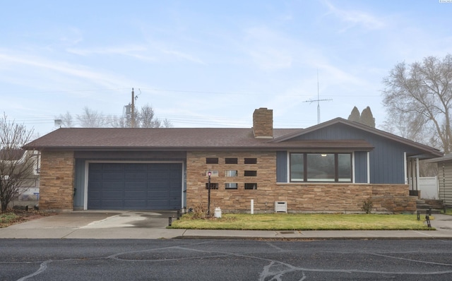 single story home with a garage