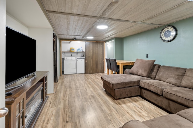 405 W 7th Ave, Ritzville, WA 99169 - living room featuring wood ceiling, light hardwood / wood-style flooring, and washer and dryer