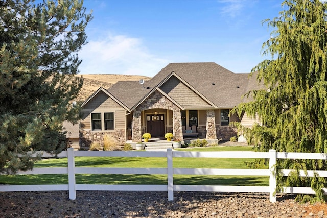 craftsman house with a front yard