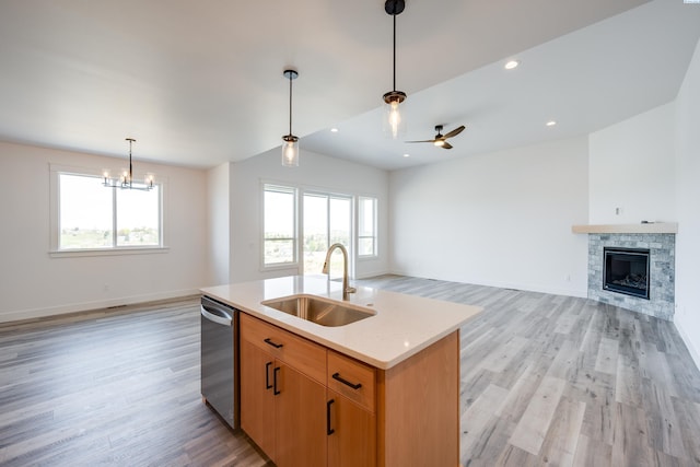 1060 SW Panorama Dr, Pullman, WA 99163 - kitchen with open floor plan, a wealth of natural light, a sink, and dishwasher