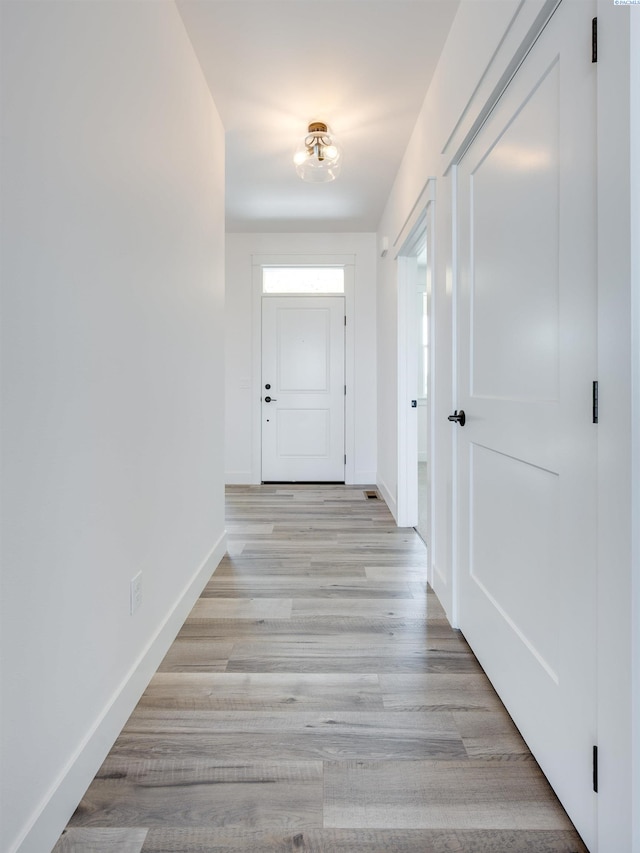 1060 SW Panorama Dr, Pullman, WA 99163 - hallway featuring baseboards and light wood-type flooring