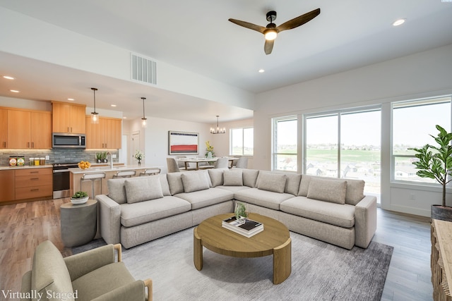 1060 SW Panorama Dr, Pullman, WA 99163 - living room with visible vents, recessed lighting, and light wood-style floors
