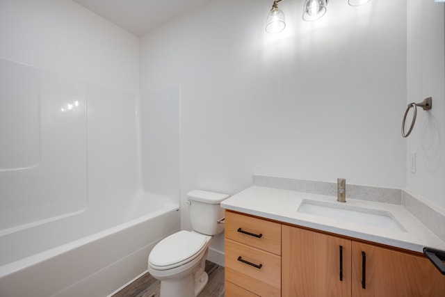 1060 SW Panorama Dr, Pullman, WA 99163 - full bath featuring vanity, toilet, and wood finished floors