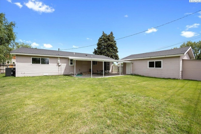 3925 W Okanogan Ave, Kennewick, WA 99336 - back of house featuring central air condition unit and a patio area
