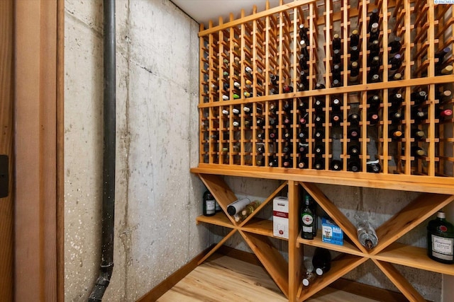 wine room with wood finished floors