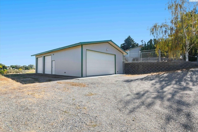 detached garage with fence