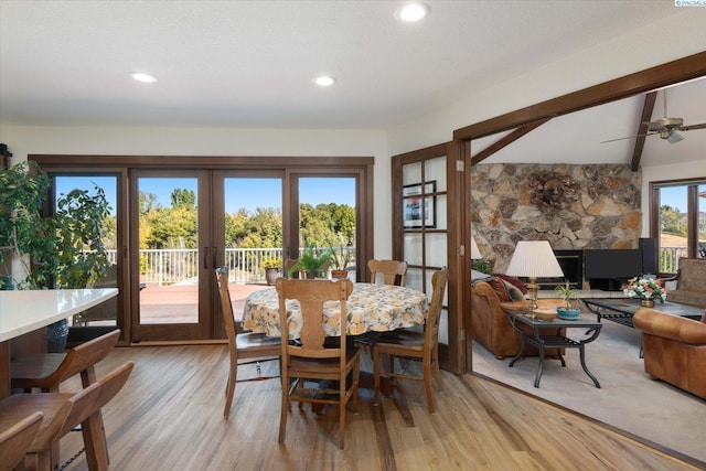 dining room with french doors, light wood finished floors, beam ceiling, and recessed lighting