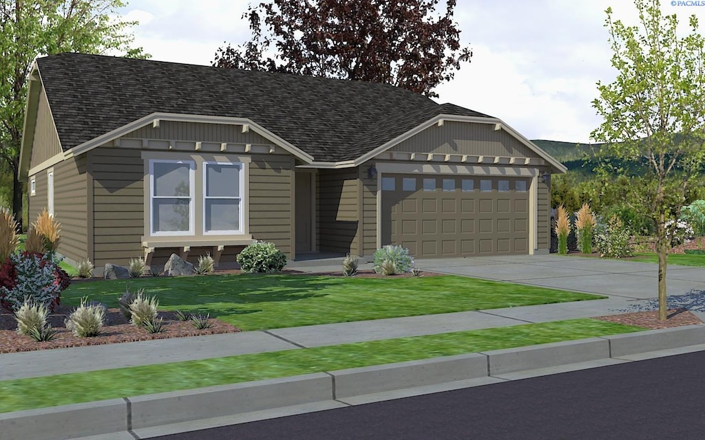 294 Ladera St, Prosser, WA 99305 - view of front of property with a garage, driveway, a shingled roof, and a front lawn