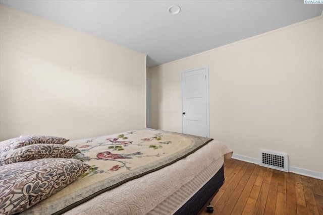 213 Bernard Ave, Richland, WA 99352 - bedroom featuring wood-type flooring and baseboards