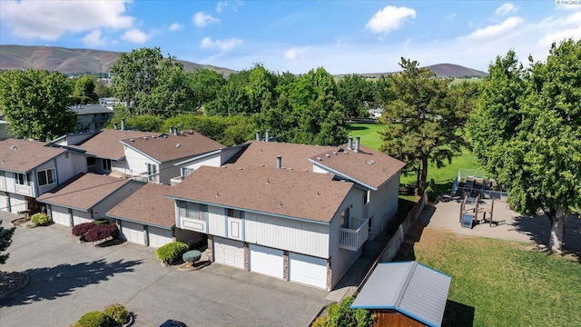 aerial perspective of suburban area with a mountain backdrop