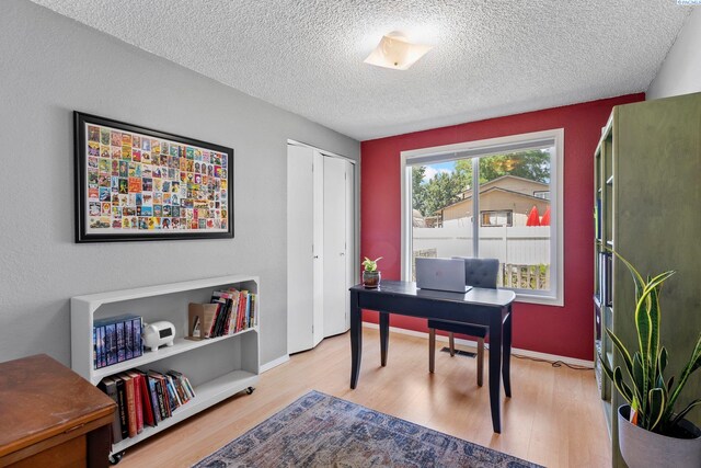 912 Rd 44, Pasco, WA 99301 - home office featuring a textured ceiling and light wood-style flooring