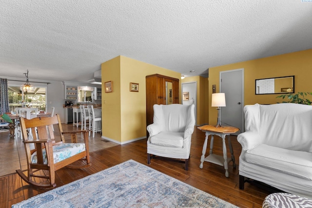 912 Rd 44, Pasco, WA 99301 - living room featuring hardwood / wood-style flooring and a textured ceiling