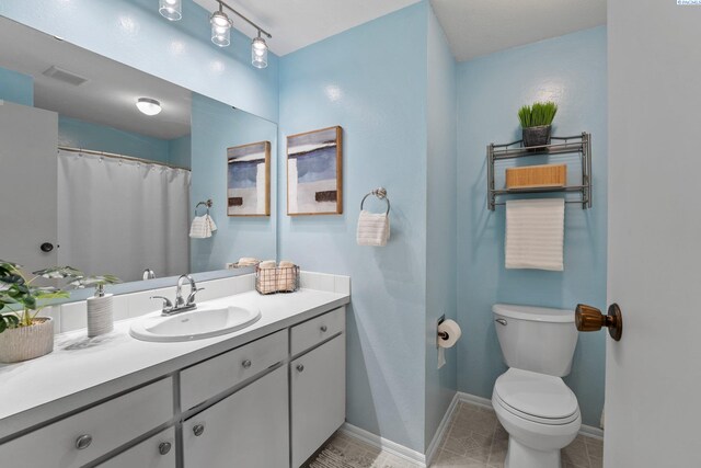 912 Rd 44, Pasco, WA 99301 - full bath featuring vanity and tile patterned floors