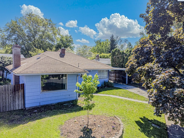 1015 Catherine St, Walla Walla, WA 99362 - view of front of home with a chimney, driveway, and roof with shingles