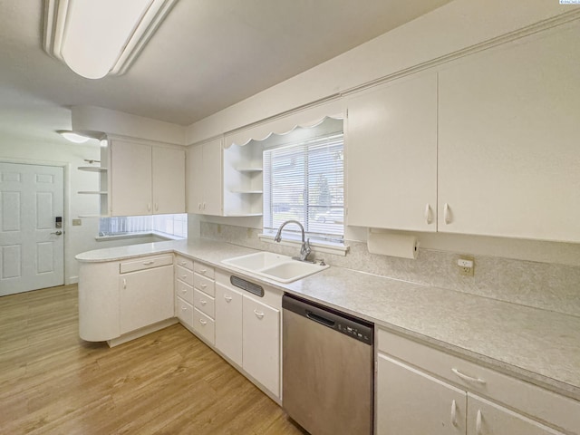 1015 Catherine St, Walla Walla, WA 99362 - kitchen featuring open shelves, dishwasher, a sink, light wood-style floors, and light countertops