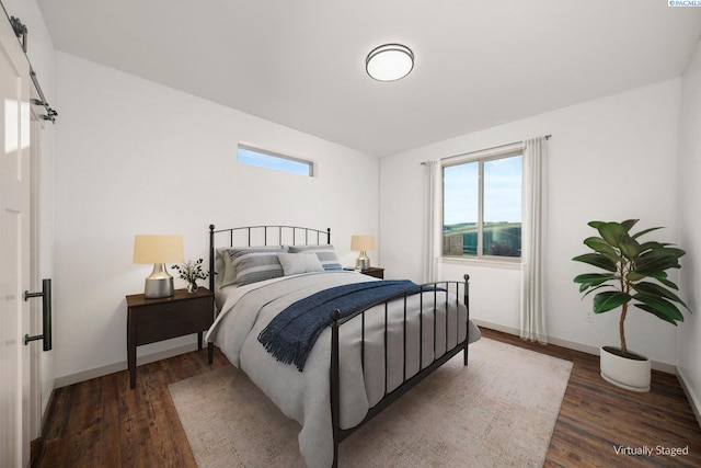 bedroom with dark hardwood / wood-style flooring