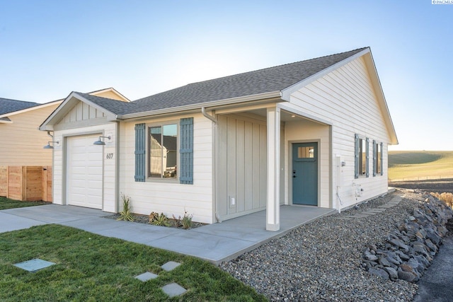 ranch-style home featuring a garage