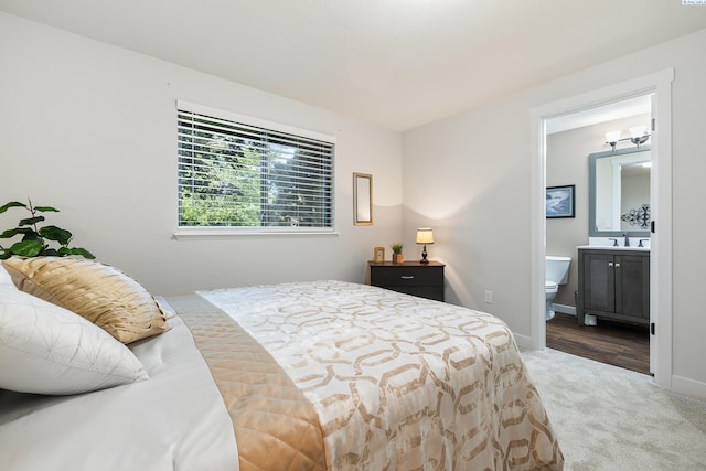 1830 W 23rd Ave, Kennewick, WA 99337 - bedroom with carpet, a sink, connected bathroom, and baseboards