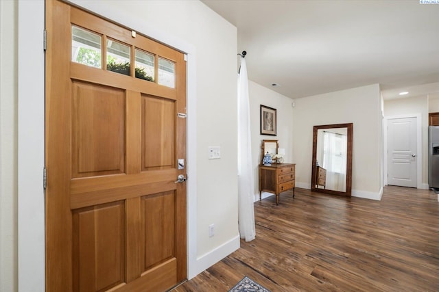 5719 W 15th Ave, Kennewick, WA 99338 - entrance foyer featuring dark wood-style floors and baseboards