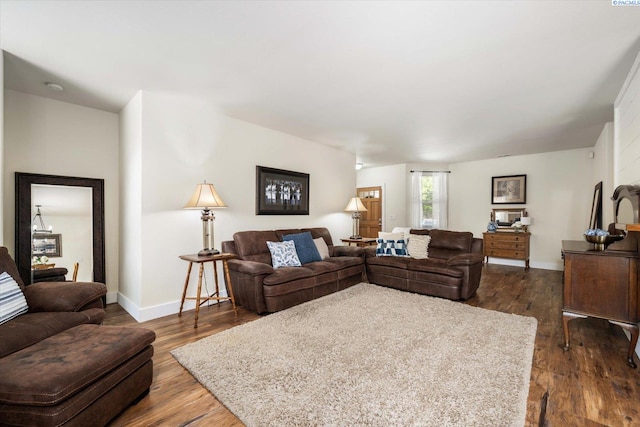 5719 W 15th Ave, Kennewick, WA 99338 - living room featuring dark wood-style flooring and baseboards