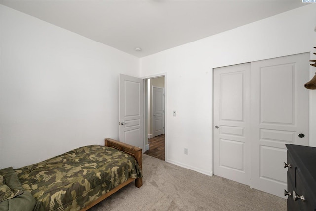 5719 W 15th Ave, Kennewick, WA 99338 - bedroom featuring light colored carpet and a closet