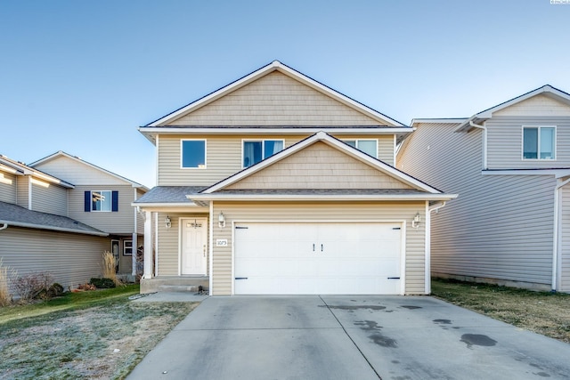 view of front of property featuring a garage