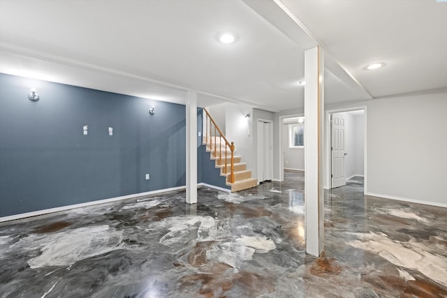 finished below grade area with marble finish floor, stairs, baseboards, and recessed lighting