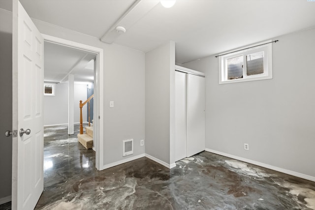 interior space with visible vents, baseboards, and stairs