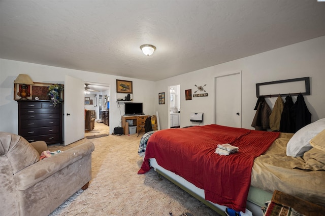 bedroom featuring carpet flooring and ensuite bathroom