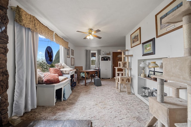 interior space featuring a ceiling fan and a healthy amount of sunlight