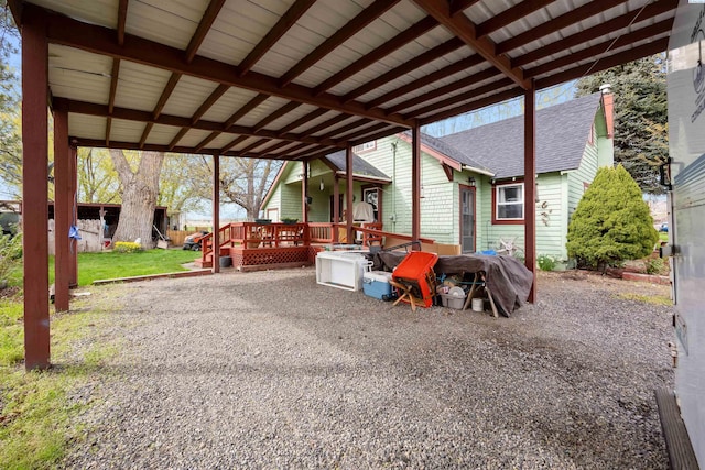 view of patio with a wooden deck