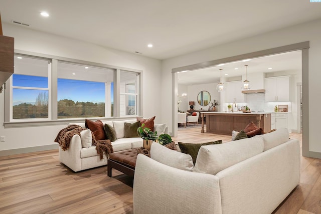 living room featuring light wood-type flooring