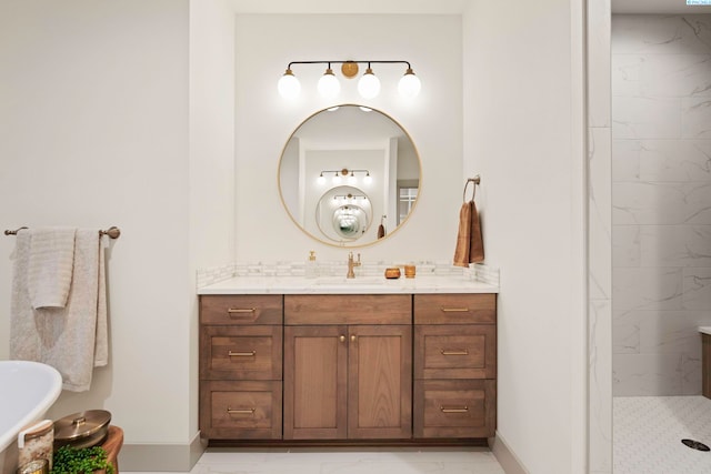 bathroom featuring vanity and tiled shower