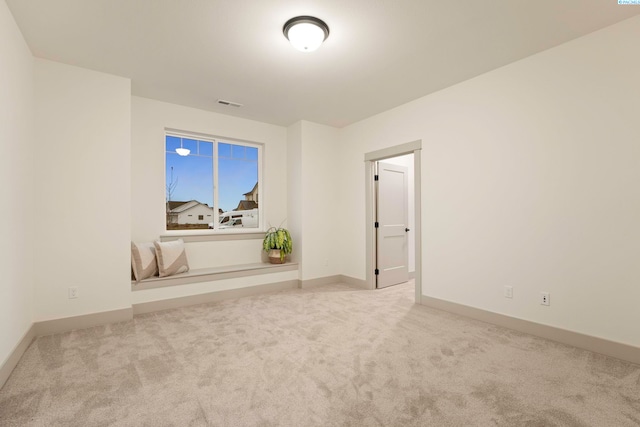 view of carpeted spare room