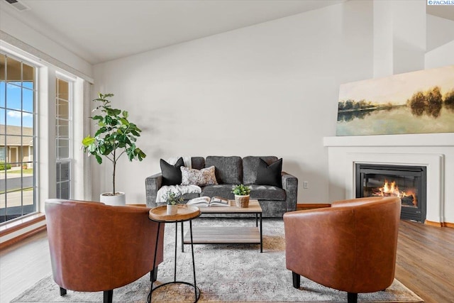 2418 S Arthur Ct, Kennewick, WA 99338 - living area with wood finished floors and a glass covered fireplace