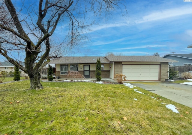 single story home featuring an attached garage, brick siding, fence, concrete driveway, and a front yard