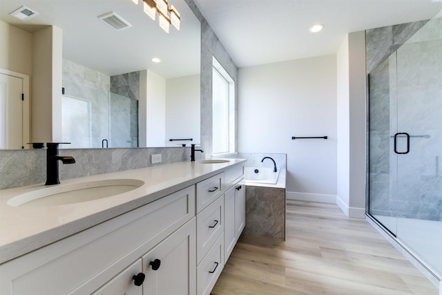 1557 Livorno Ave, Richland, WA 99352 - full bathroom with a sink, visible vents, a stall shower, and a garden tub