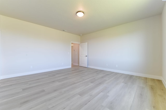 1557 Livorno Ave, Richland, WA 99352 - spare room with light wood finished floors, baseboards, and visible vents