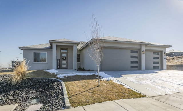 prairie-style house with a garage