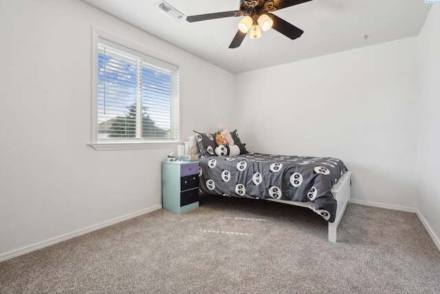 bedroom featuring carpet, baseboards, and a ceiling fan