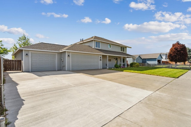 view of front facade with an attached garage, driveway, stucco siding, and a porch