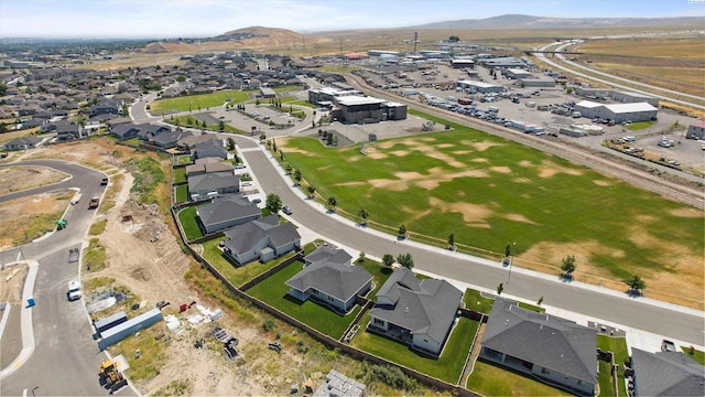 6564 W 38th Ave, Kennewick, WA 99338 - aerial overview of property's location with a mountainous background and nearby suburban area
